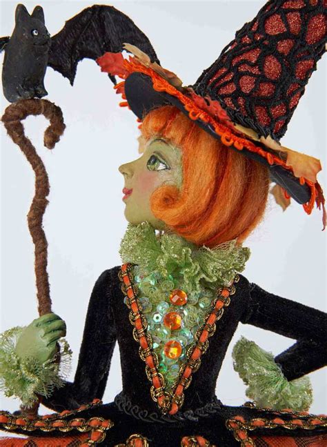 Exploring the history of Halloween witch on tree figurines